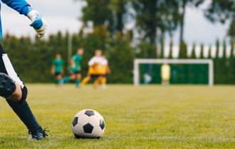 Taking a goal kick to keep possession of the ball