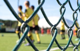 Watching players at training