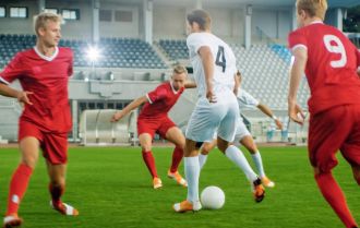 Player dribbling past team