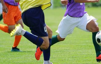 Young players passing the ball