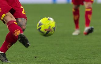 Players passing the ball in the air between them