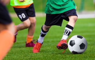 Players press to win the ball