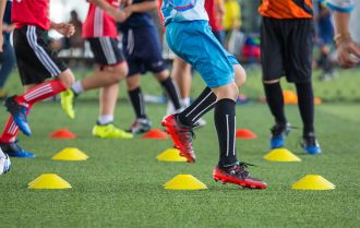 Players cross into the penalty area
