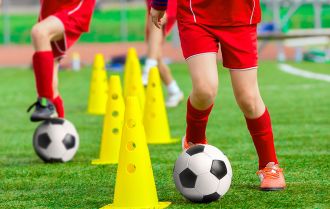 Coach working on drills